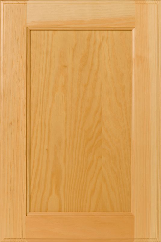 Wooden cabinet door with a recessed panel and frame, natural wood grain.