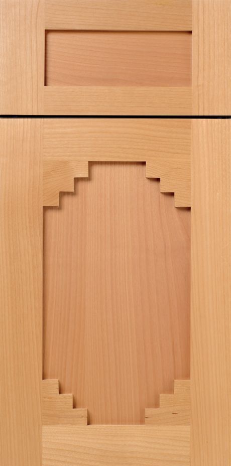 Wooden cabinet doors with a stepped oval design.