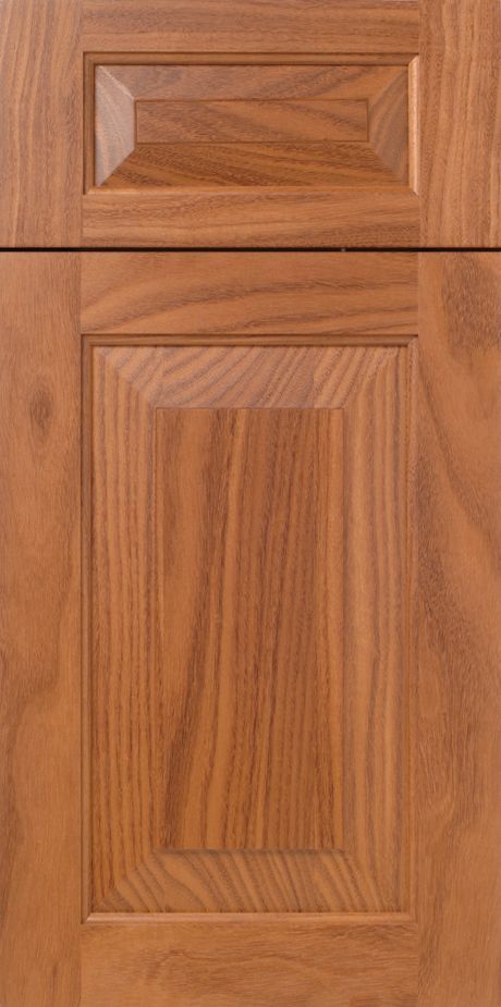 Wooden cabinet door with a raised-panel design, featuring warm brown tones and wood grain detail.