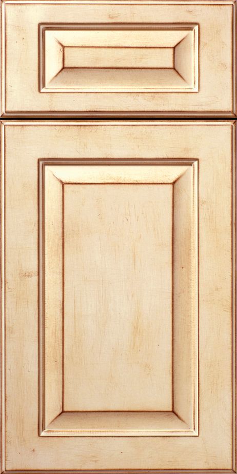 Cream-colored kitchen cabinet door with raised panel and a rectangular top detail.