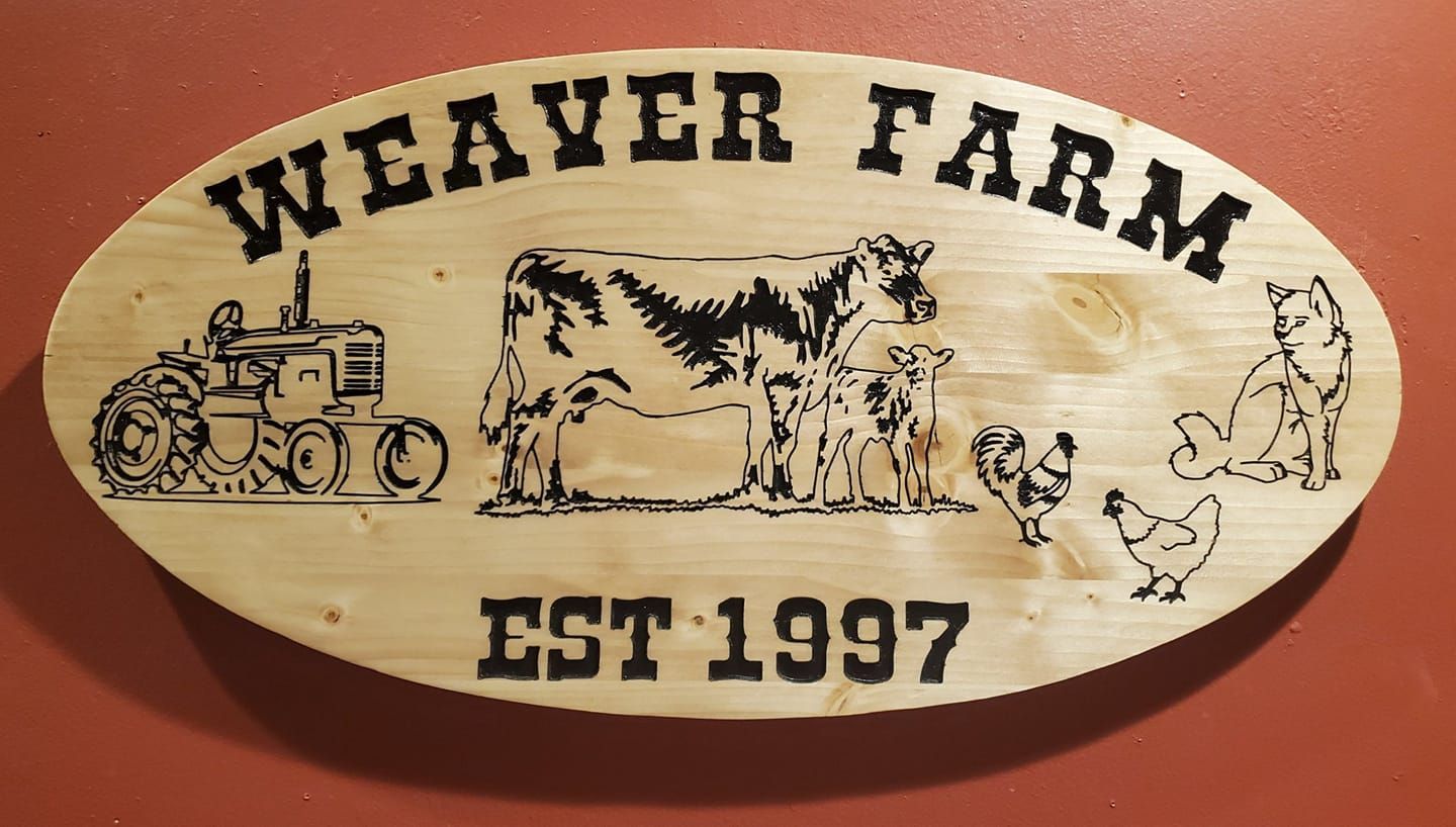 Oval wooden sign with