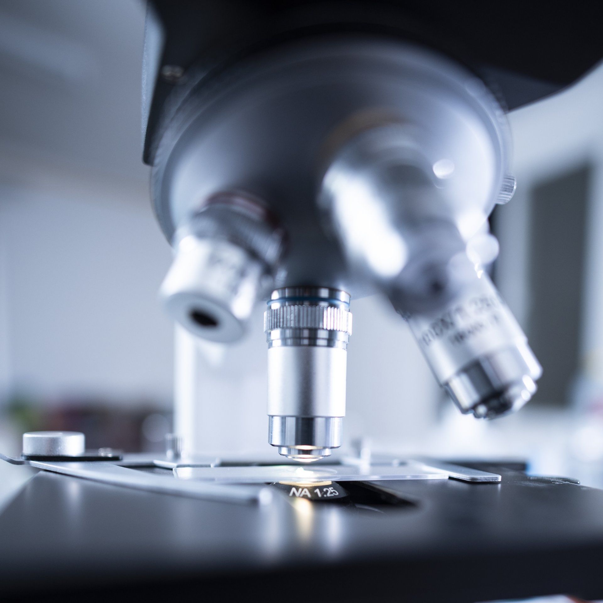 Sandstone Therapeutic Massage / A picture of a microscope in a scientific lab.