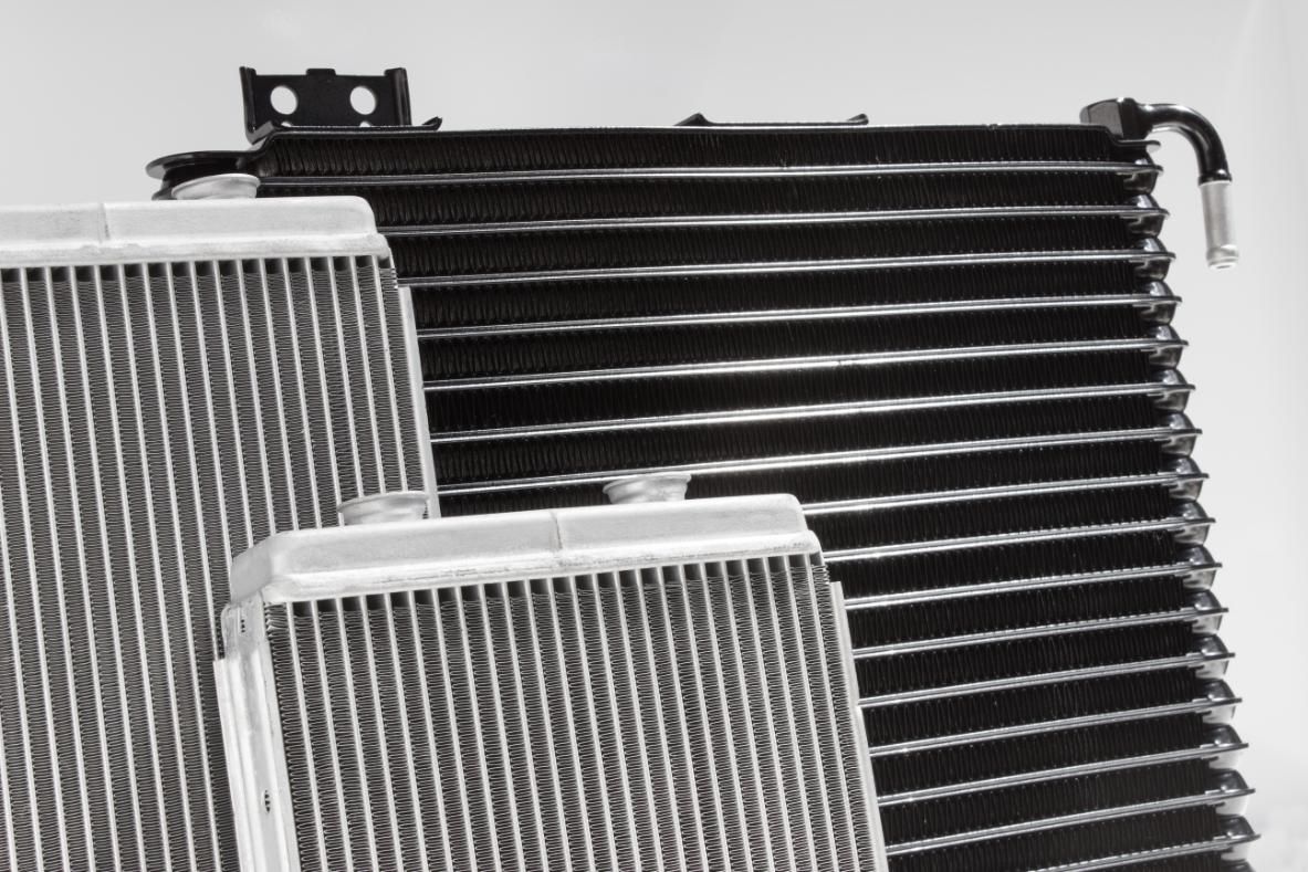 A Black And White Photo Of Three Radiators On A White Surface — Hastings Diesel Service In Laurieton, NSW
