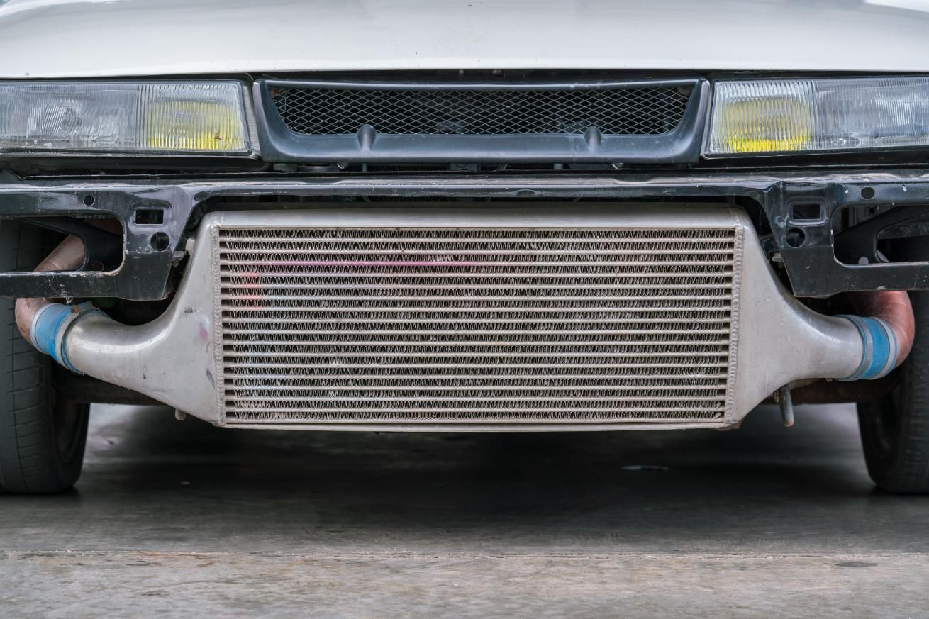 A Close Up Of A Cars Front Bumper With An Intercooler — Hastings Diesel Service In Wauchope, NSW