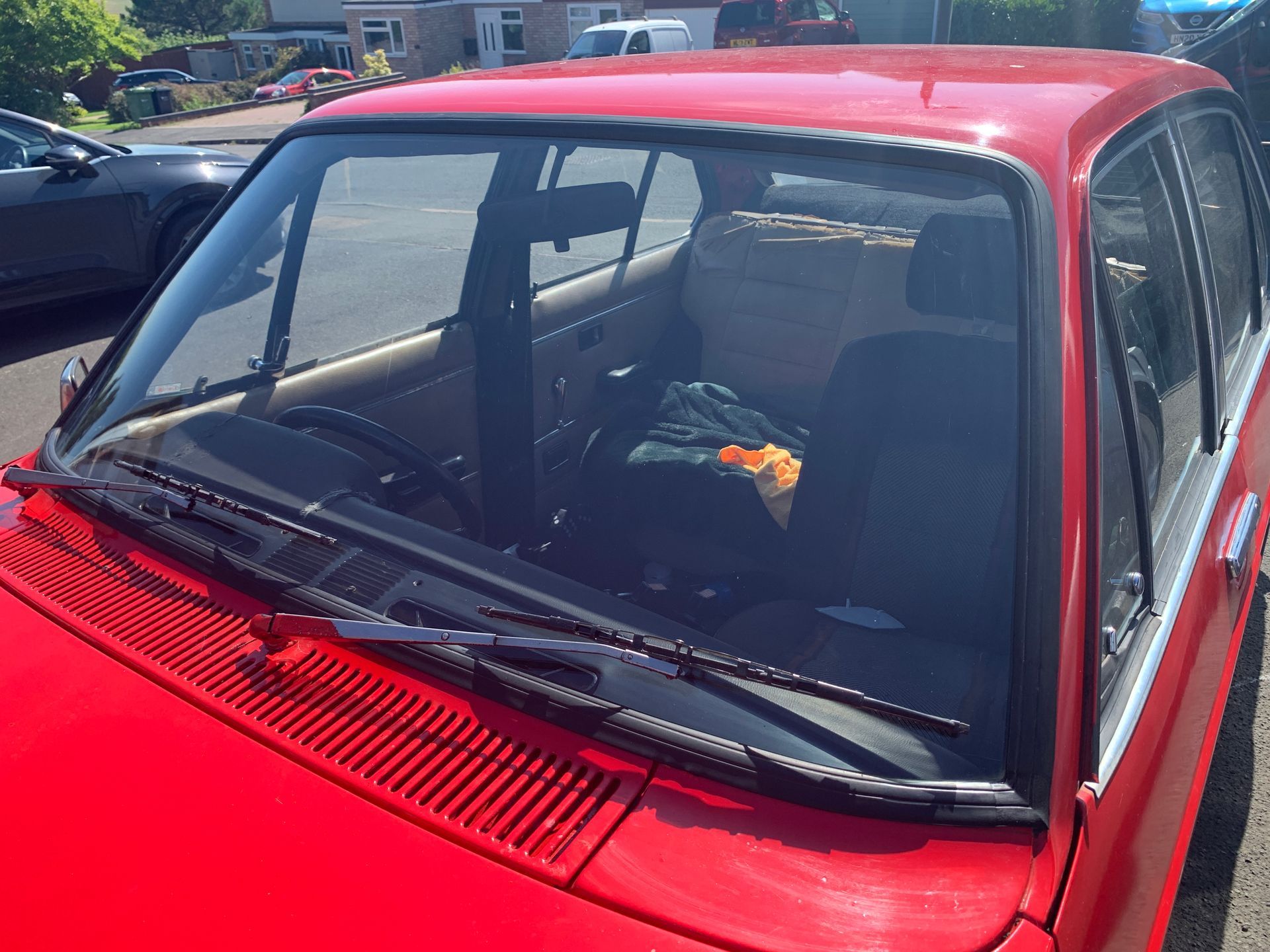 Eziglass - Vehicle Glazing Services gallery image. Escort mk2 windscreen rubber and chip repair.