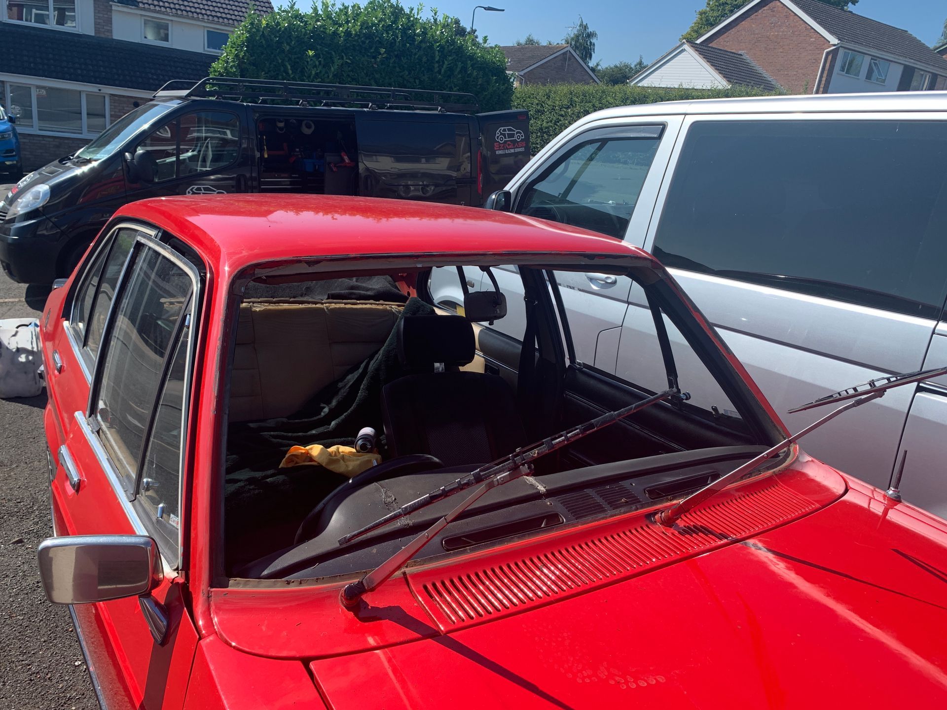 Eziglass - Vehicle Glazing Services gallery image. Escort mk2 windscreen rubber and chip repair.