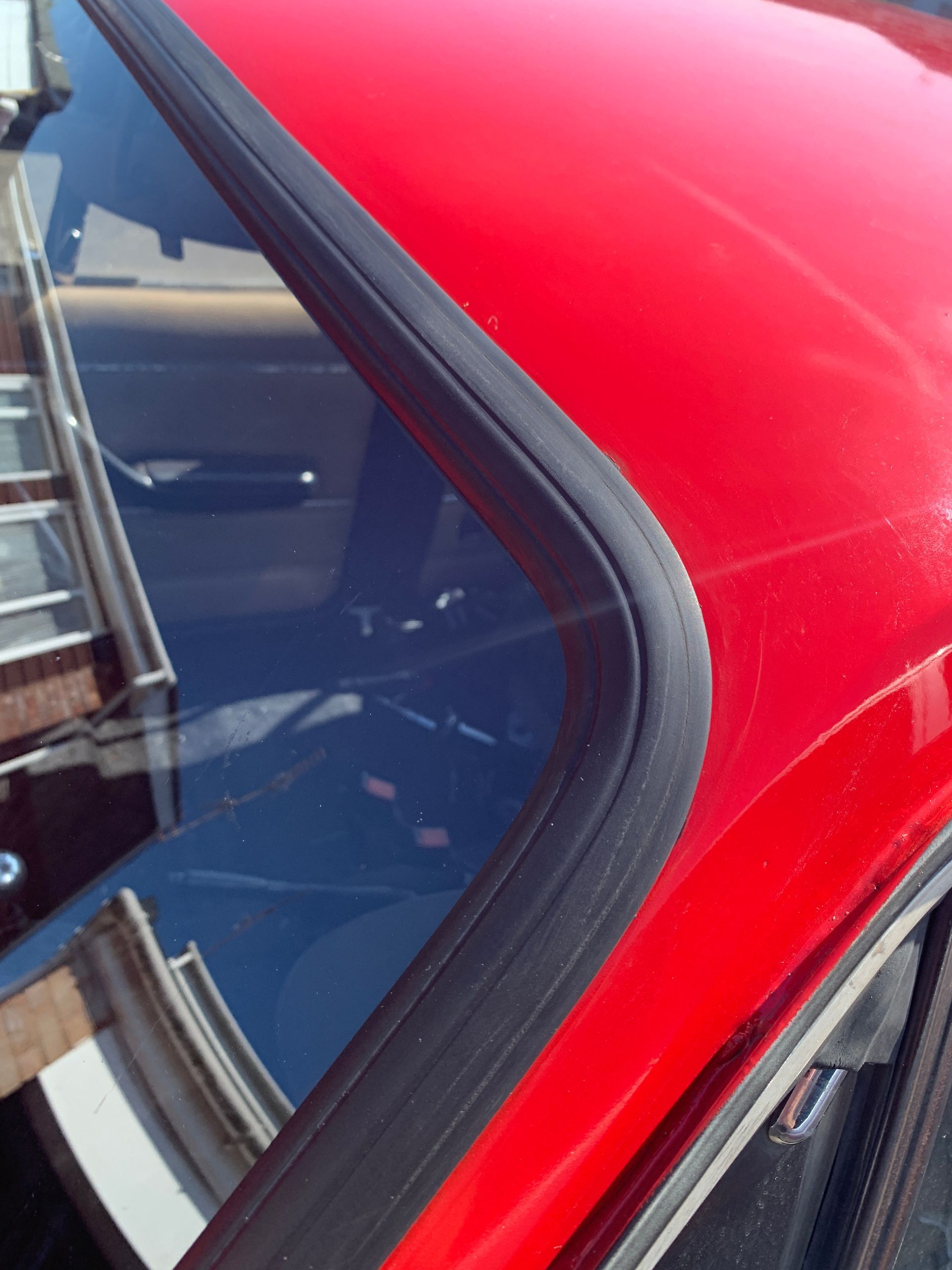 Eziglass - Vehicle Glazing Services gallery image. Escort mk2 windscreen rubber and chip repair.