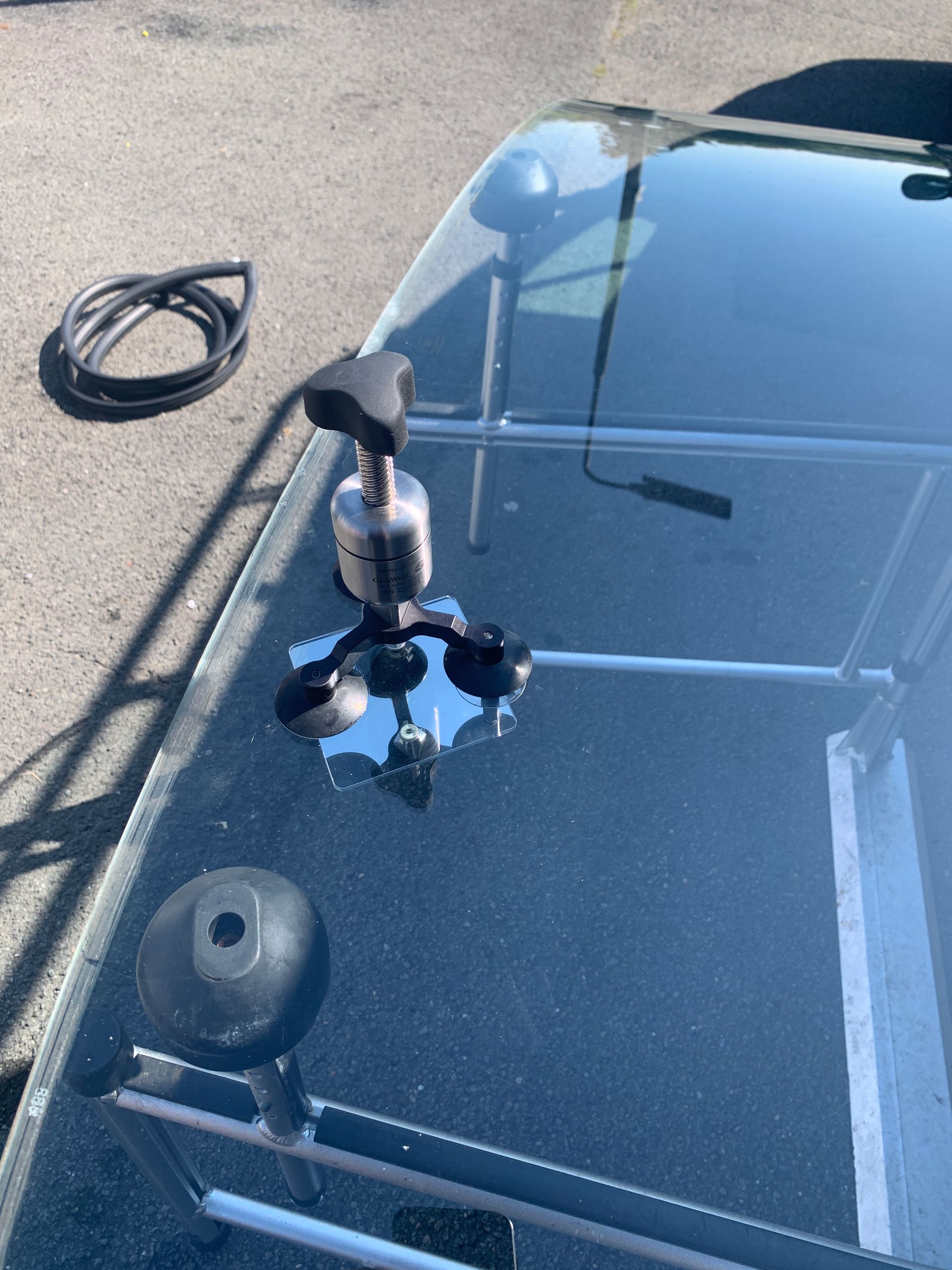 Eziglass - Vehicle Glazing Services gallery image. Escort mk2 windscreen rubber and chip repair.