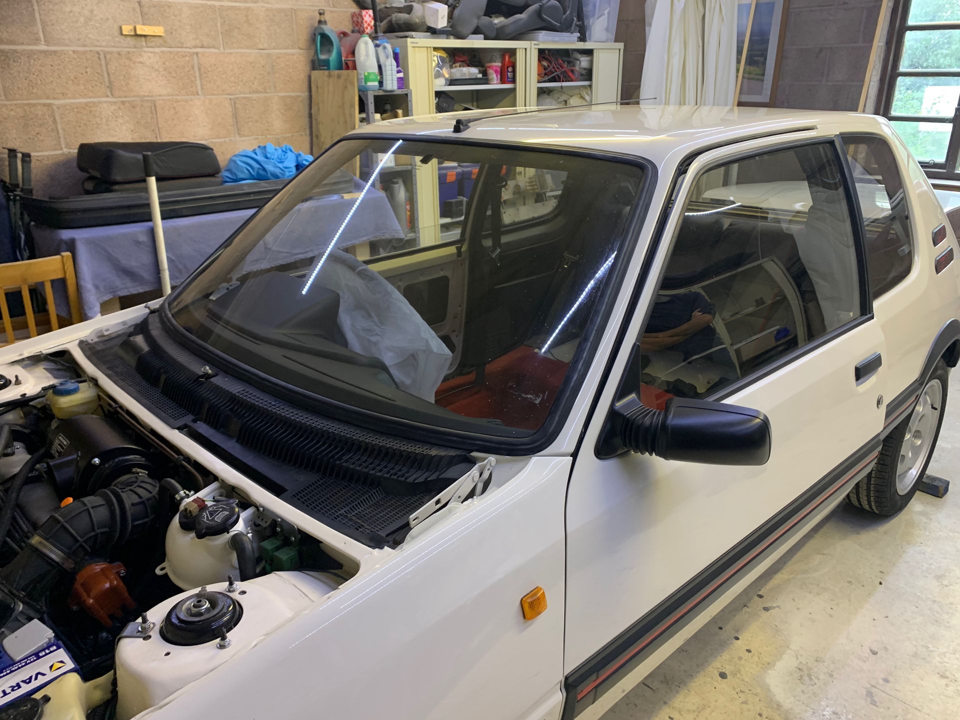 Eziglass - Vehicle Glazing Services gallery image. Peugeot 205 windscreen and heated rear window installation.