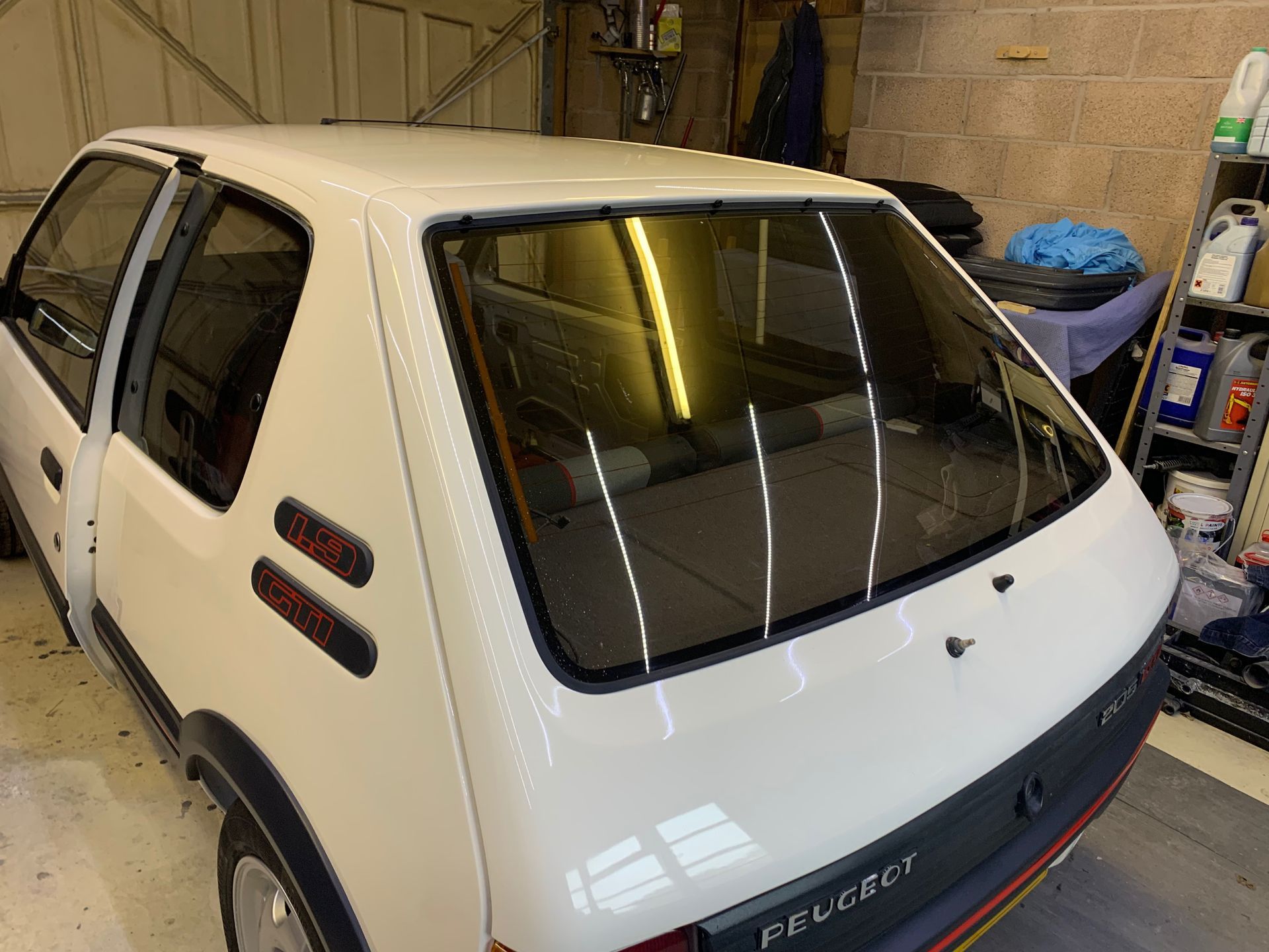 Eziglass - Vehicle Glazing Services gallery image. Peugeot 205 windscreen and heated rear window installation.