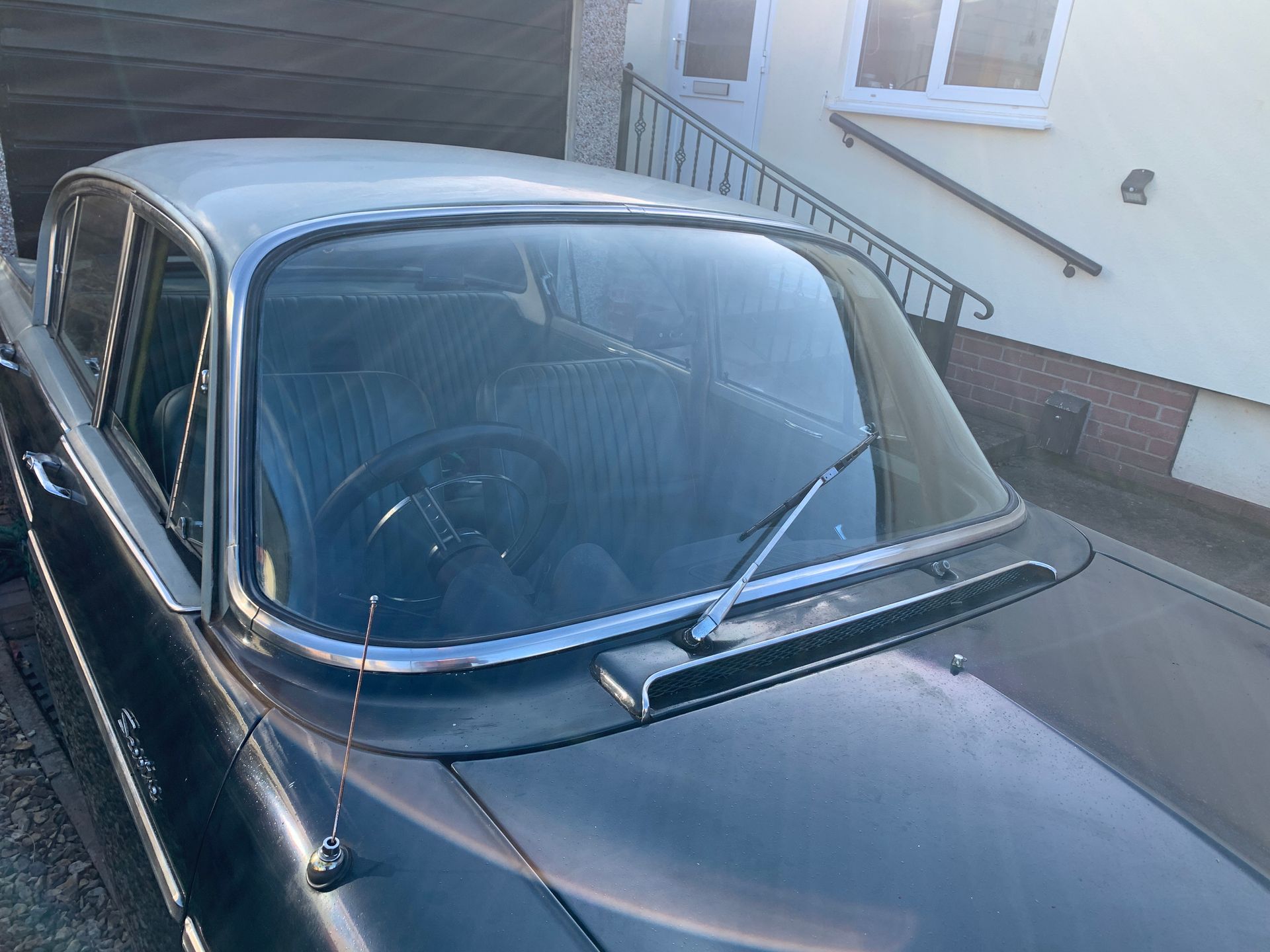 Eziglass - Vehicle Glazing Services gallery image. Escort mk2 windscreen rubber and chip repair.