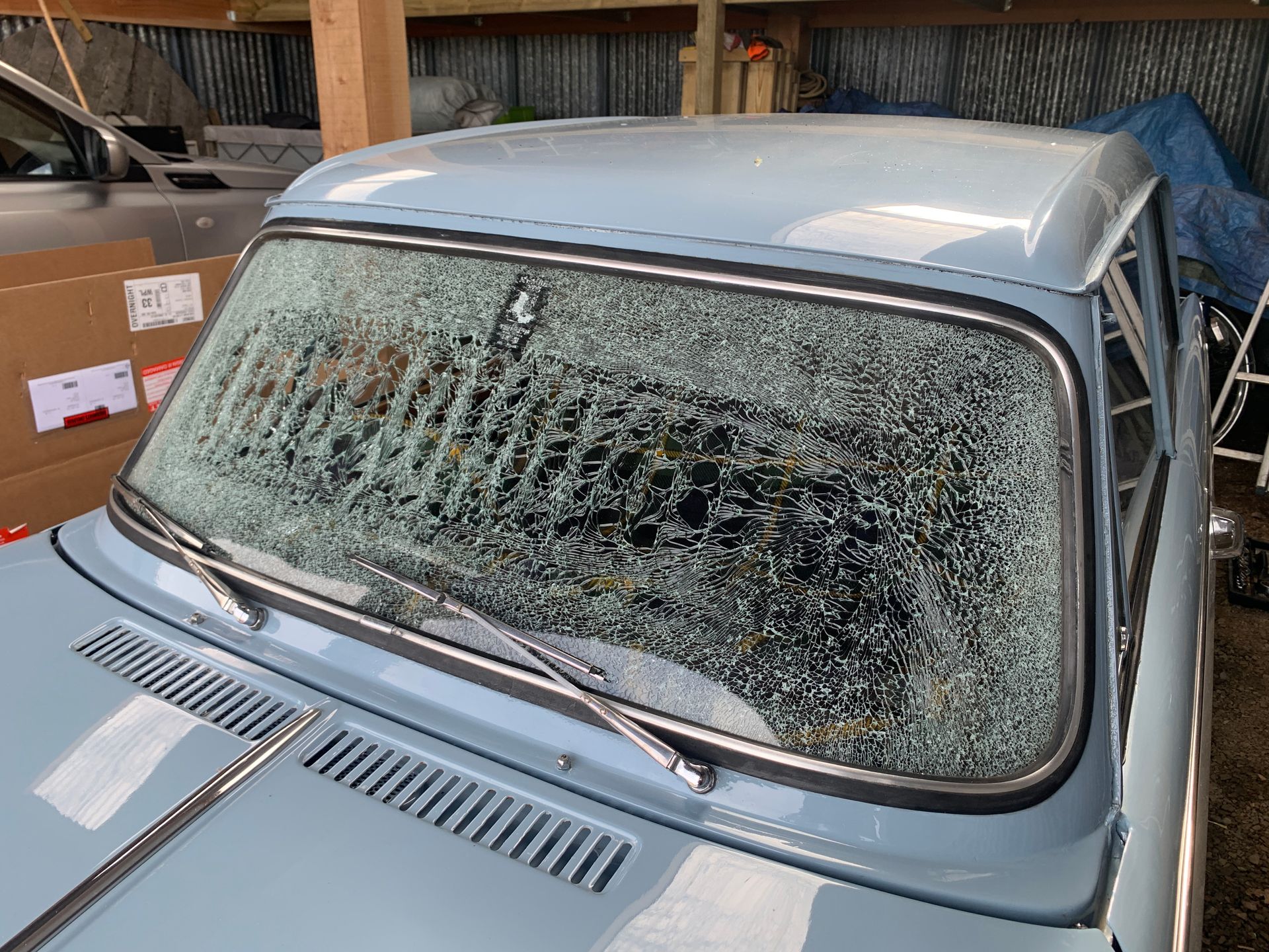 Eziglass - Vehicle Glazing Services gallery image. Escort mk2 windscreen rubber and chip repair.