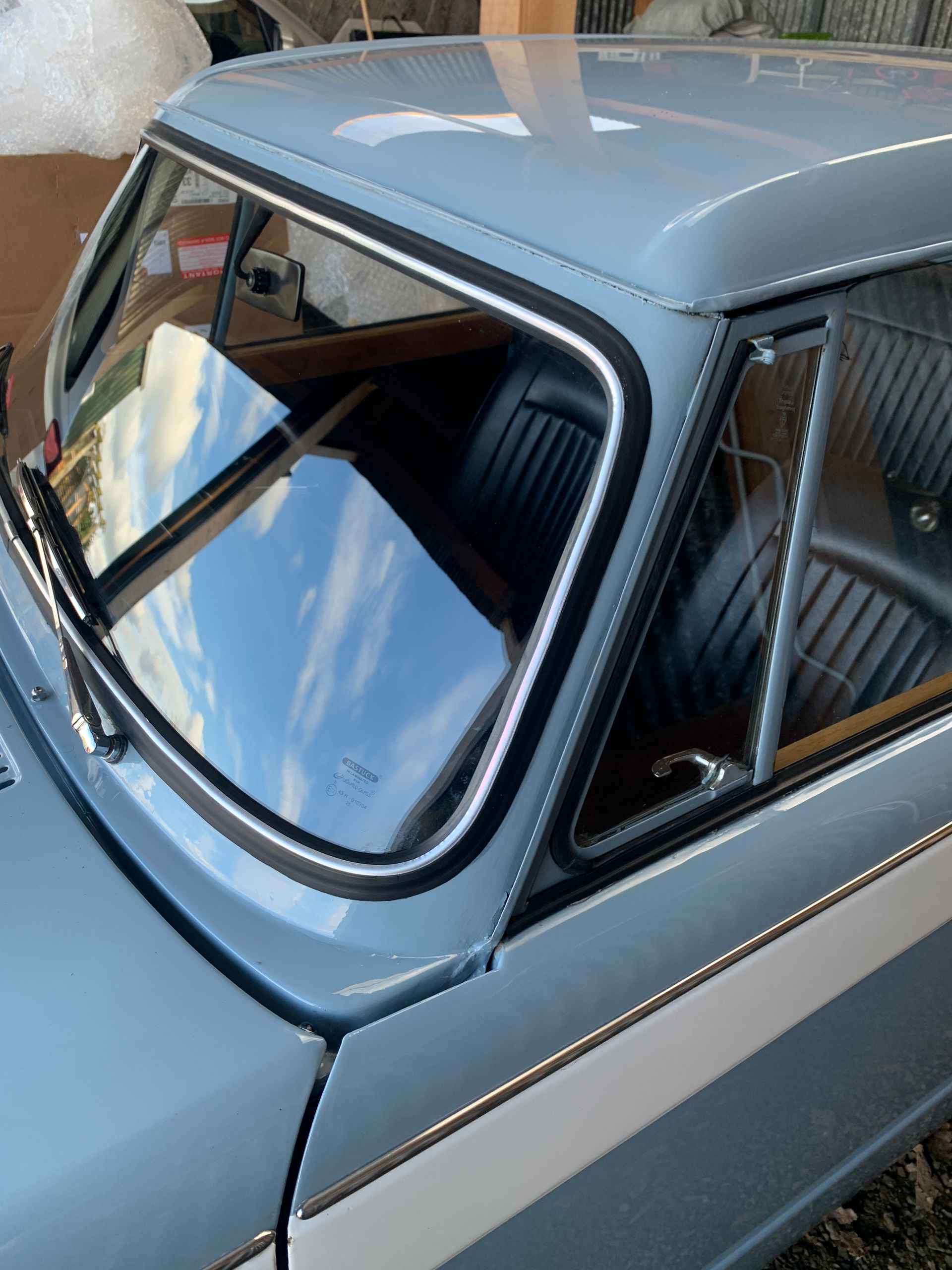 Eziglass - Vehicle Glazing Services gallery image. Escort mk2 windscreen rubber and chip repair.