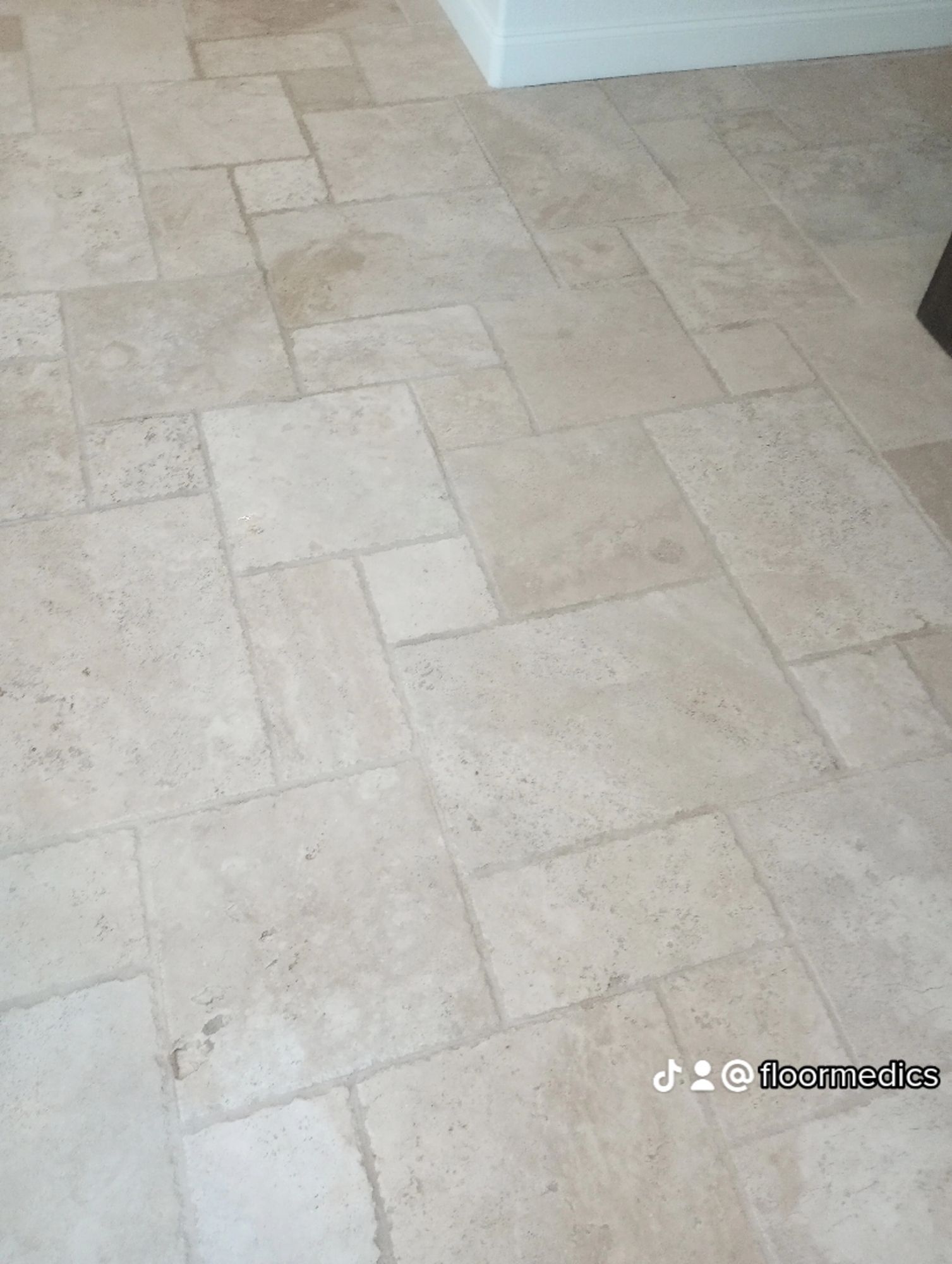 A close up of a tiled floor in a room