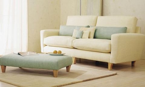 two seater sofa and small table