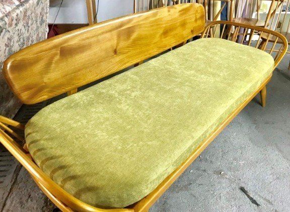 wooden sofa with mattress