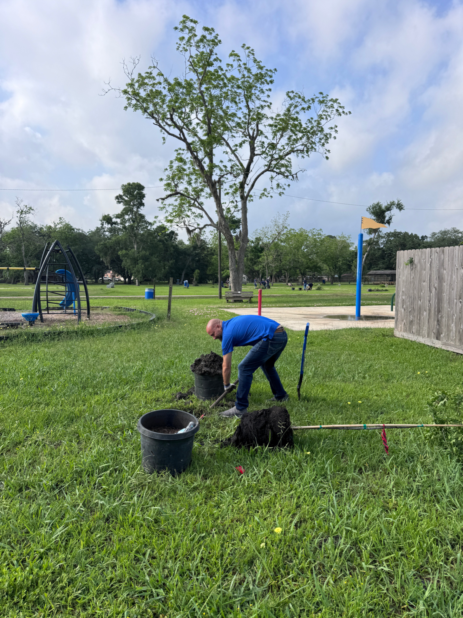 A poster for a community planting and clean up event.