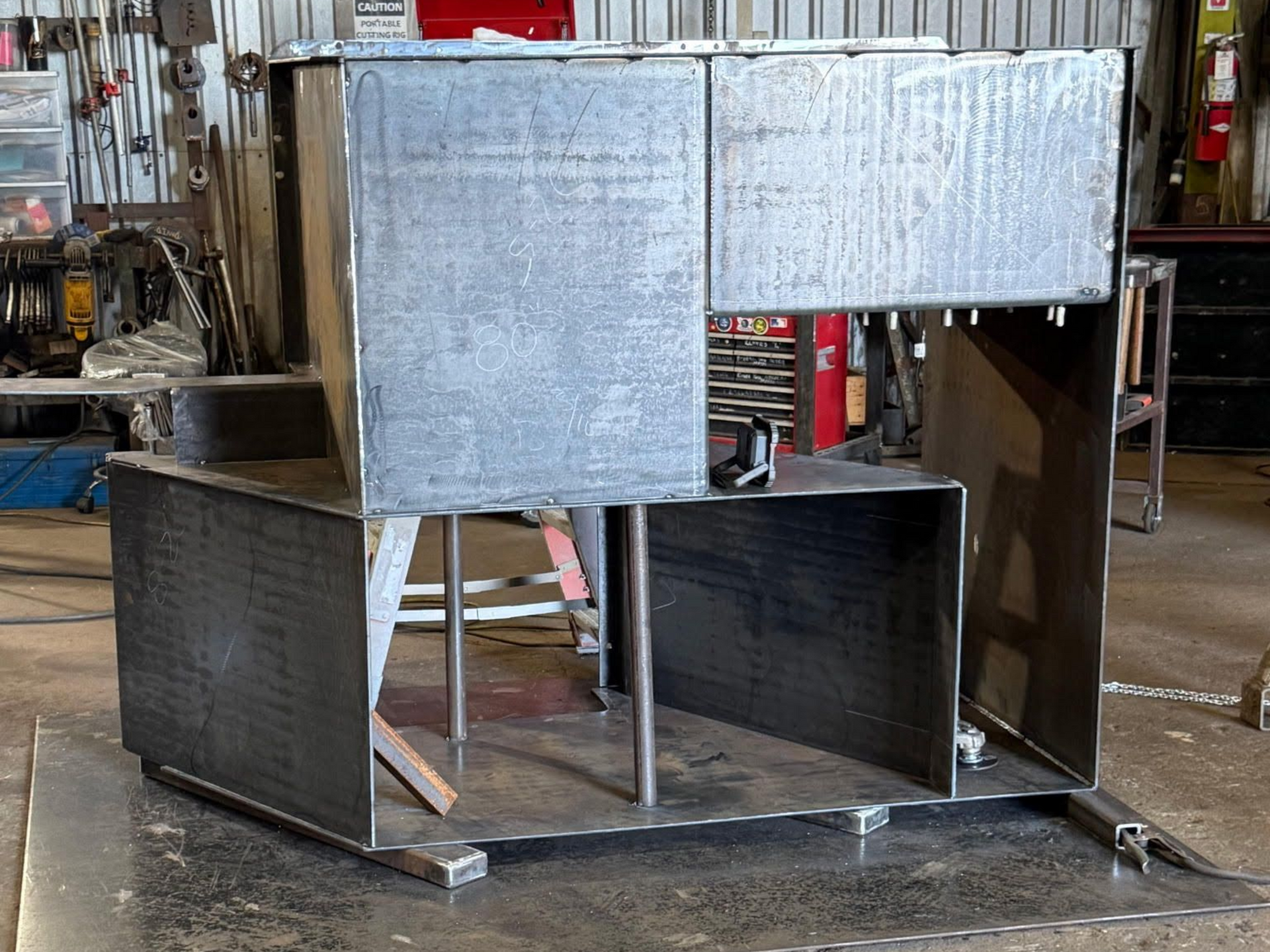 Welded metal structure in a workshop, early fabrication of an industrial wastewater system on a metal base
