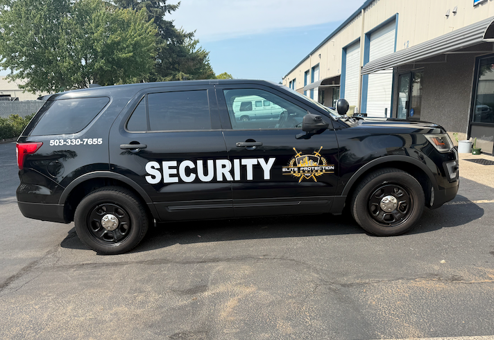 Black security SUV with white 