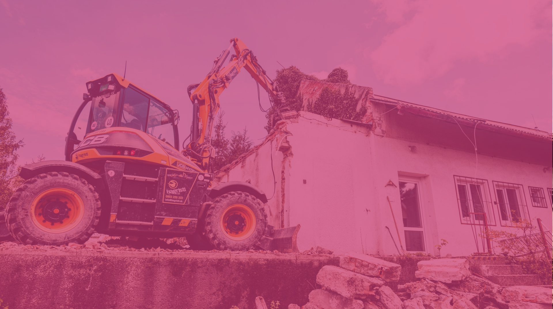 Excavator demolishing a house. Residential project demolition.