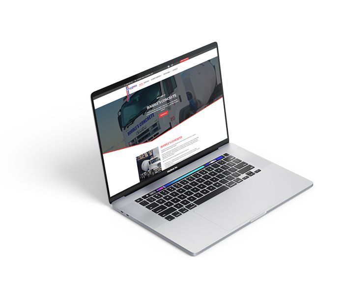a laptop computer is open to a website with trucks on it .