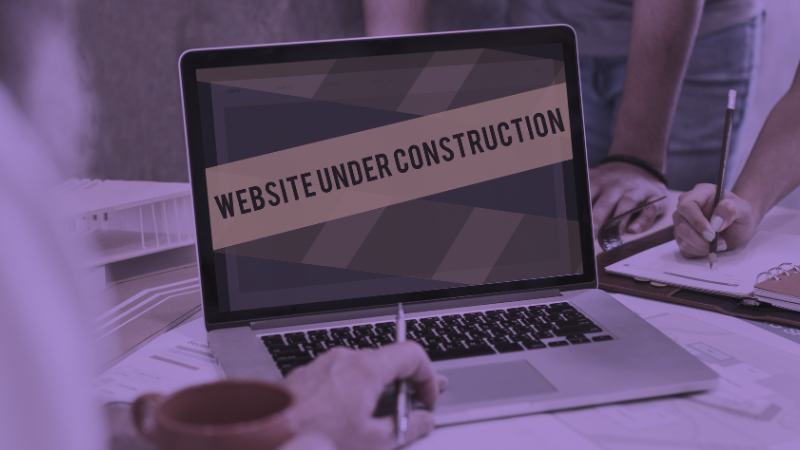 Laptop displaying website under construction