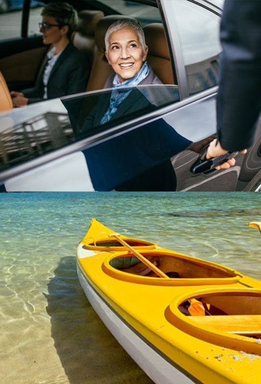 A woman is sitting in a car next to a yellow kayak