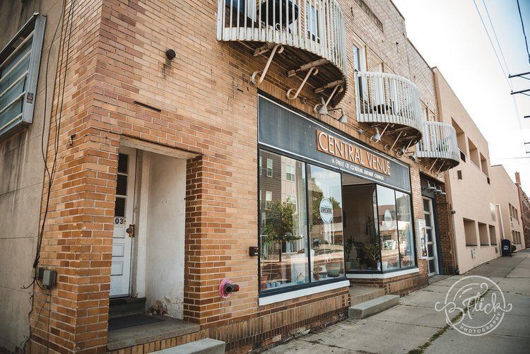 A brick building with a fire escape on the side of it.