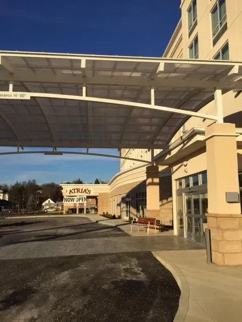 A large building with a canopy over the entrance