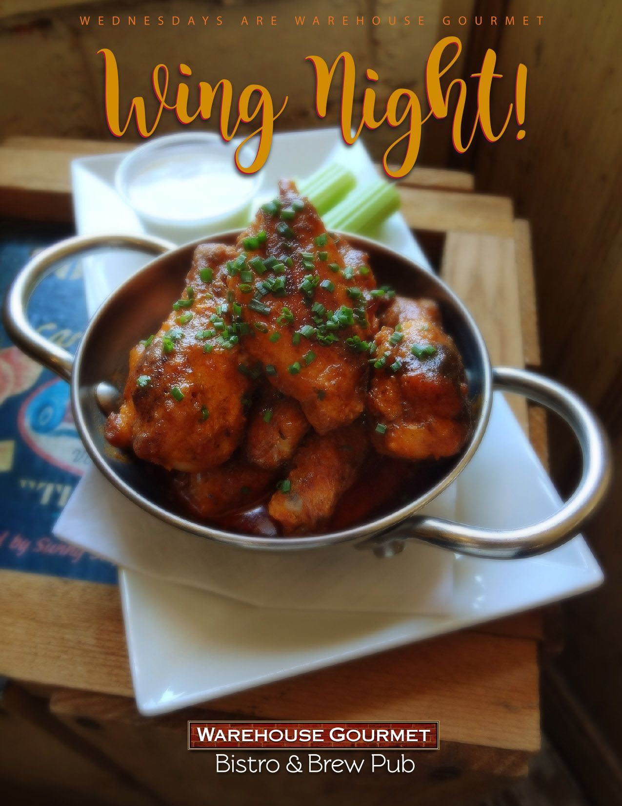 A promotional poster for Warehouse Gourmet Bistro & Brew Pub featuring a metal bowl of glazed chicken wings at Wing Night.