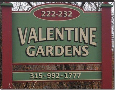 Valentine Gardens Apartments sign
