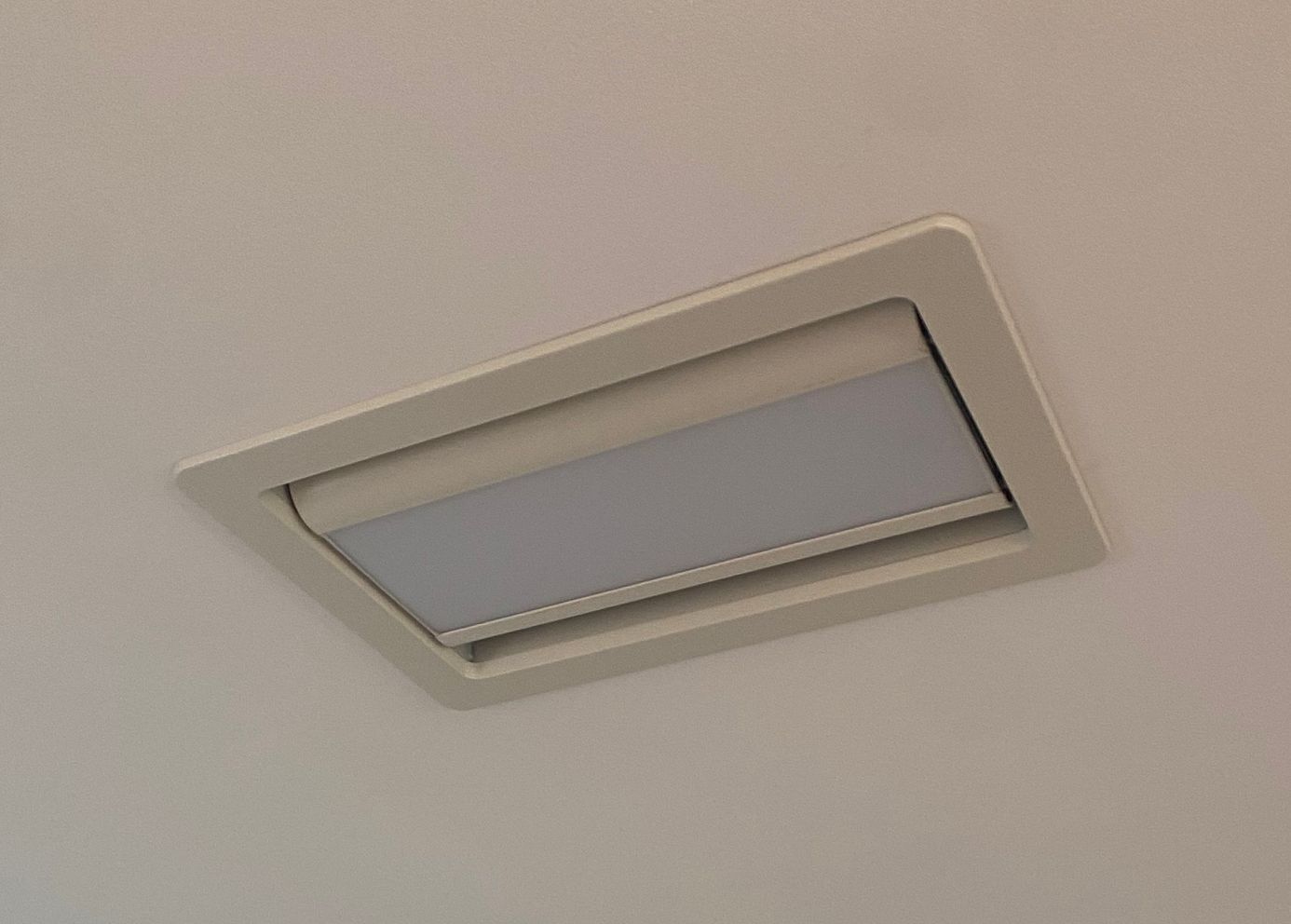 White rectangular ceiling light fixture.