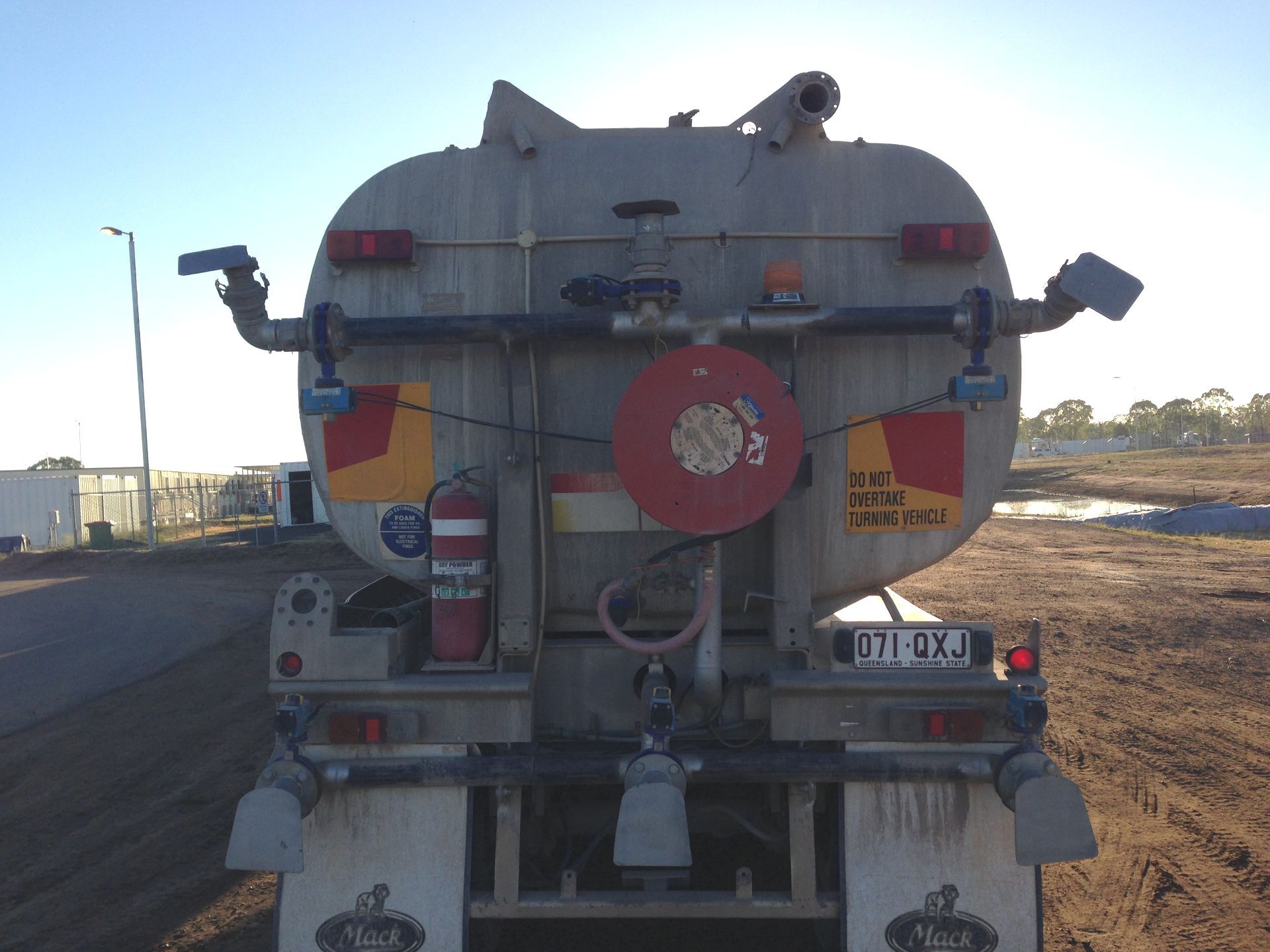 Bulldozer is Moving Dirt on a Construction Site — Chewies Tipper Hire & Haulage in Gracemere, QLD