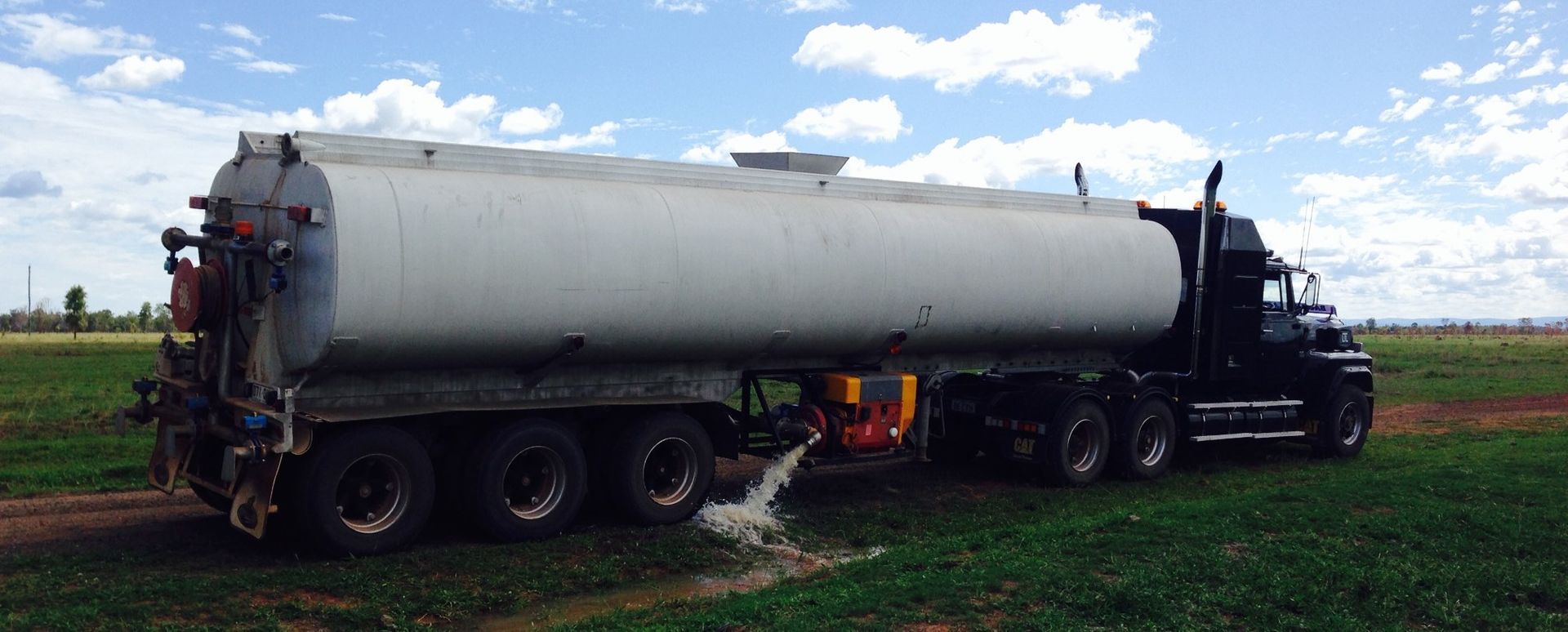 Tanker Truck is Being Filled With Water — Chewies Tipper Hire & Haulage in Gracemere, QLD