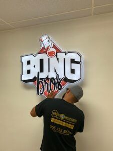 Man installing a lit 