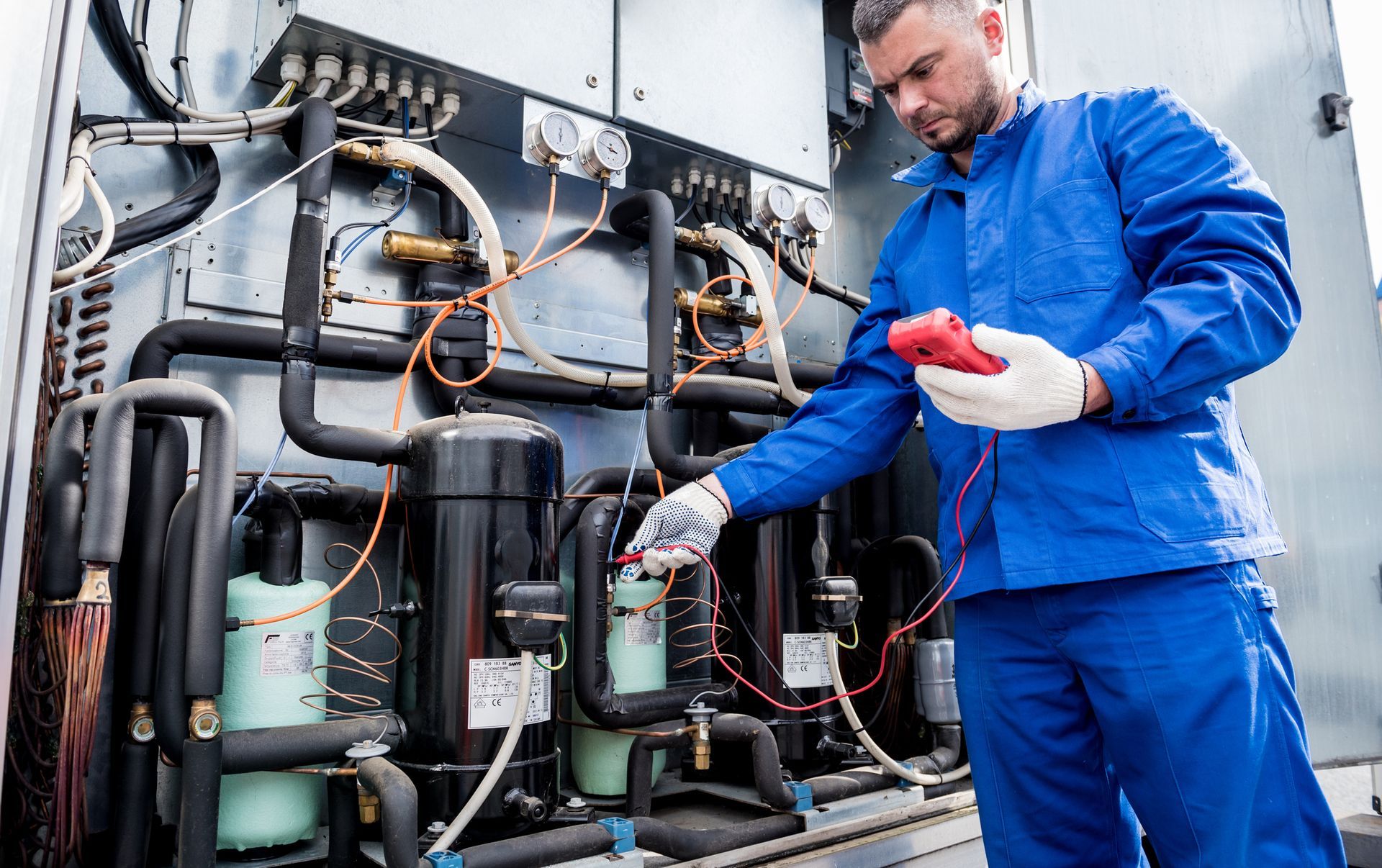 Checking Air Conditioner With Manometers — Houston, TX — AMS Houston