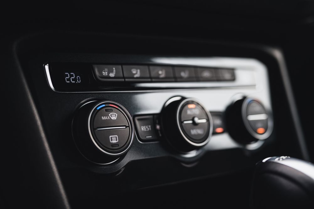 Close-up Of A Car's Climate Control Panel, Featuring Dials, Buttons — Britek Automotive in Bentley Park, QLD