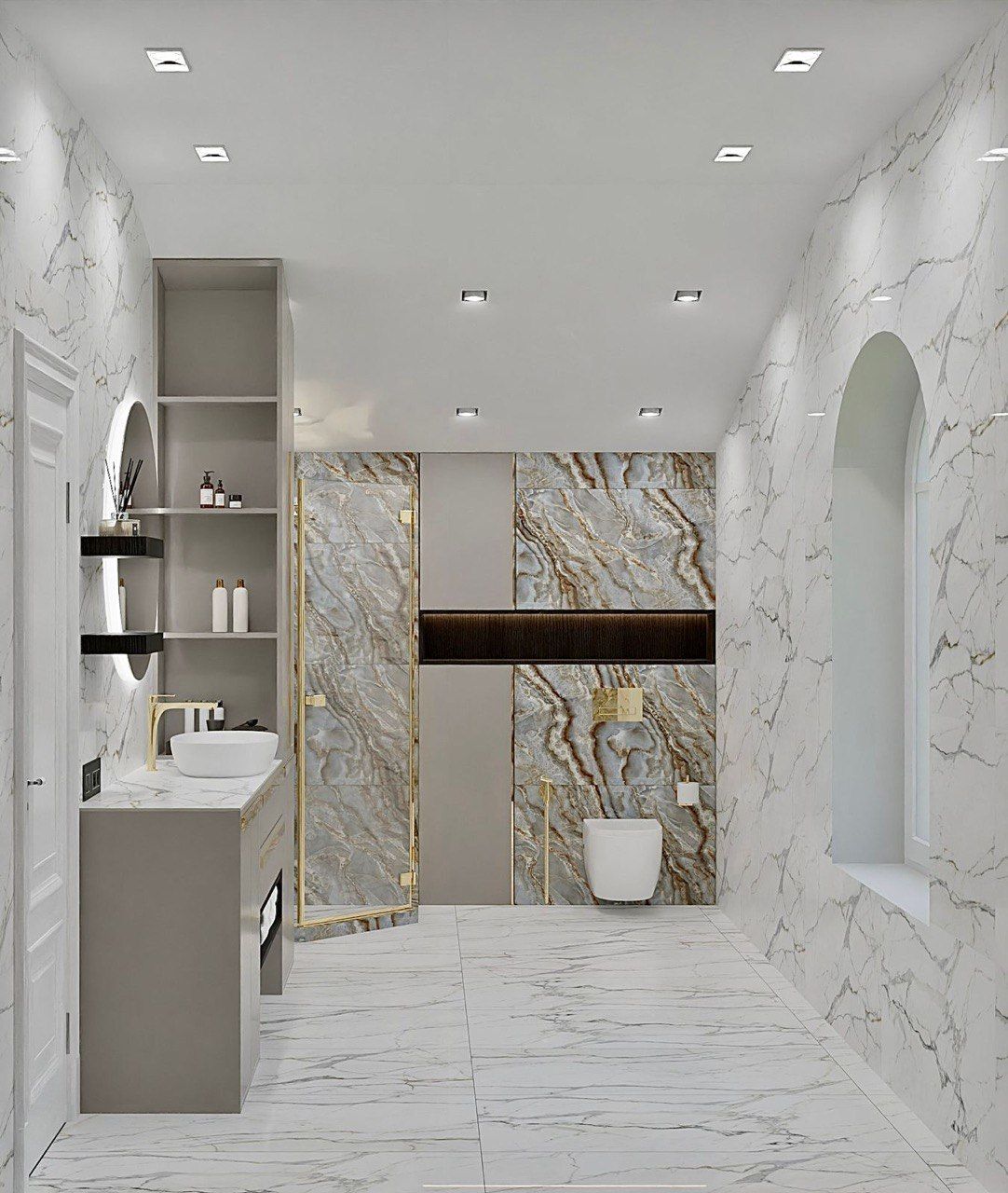 A bathroom with marble walls , a sink , toilet and shower.