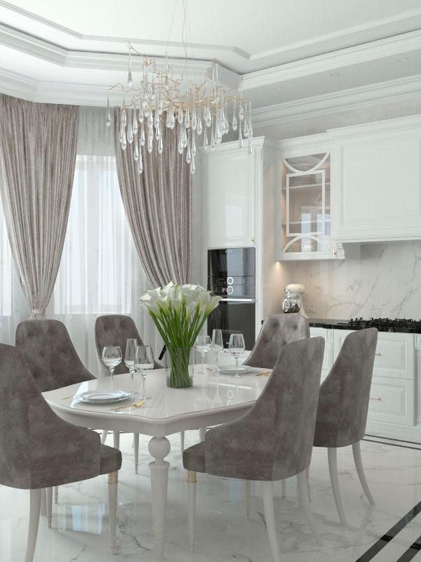 A dining room with a table and chairs and a vase of flowers.