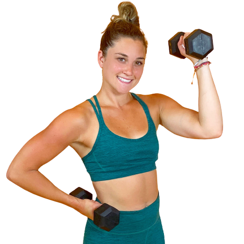 meg is holding two dumbbells in her hands and smiling while teaching inferno hot pilates in nassau county.