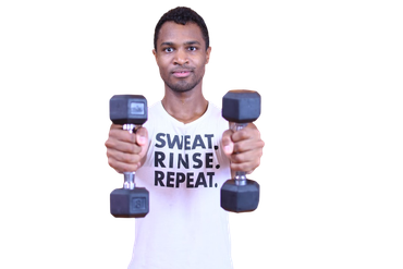 Pierce wearing a shirt that says sweat rinse repeat and holding two dumbbells getting ready to teach a bootcamp in nassau county