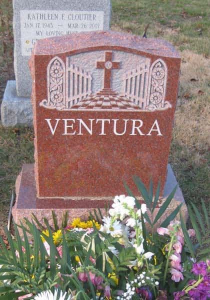 Red granite headstone with 