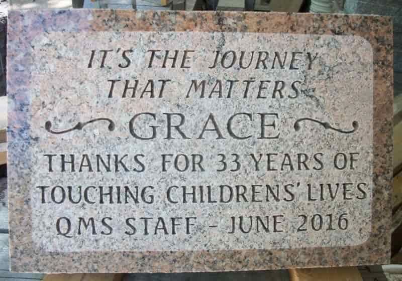 Granite plaque engraved with 