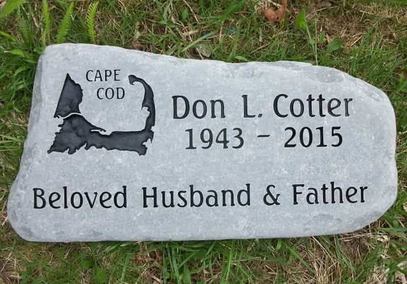 Gravestone for Don L. Cotter, 1943-2015. Features a Cape Cod outline, and text: 