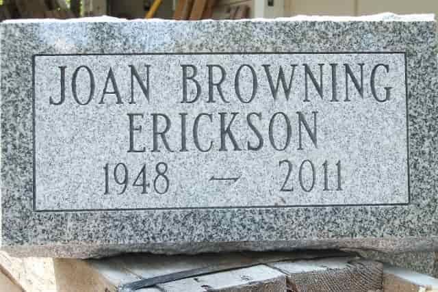 Headstone for Joan Browning Erickson: name, birth/death years (1948-2011) engraved on gray granite.