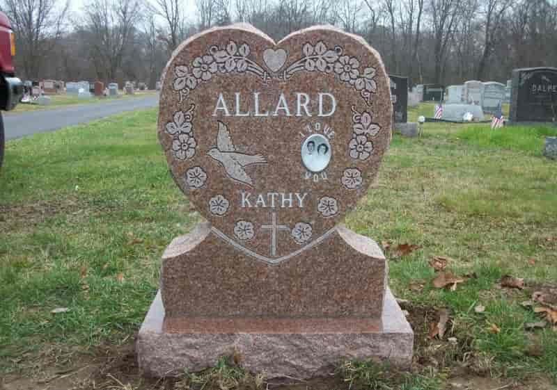 Pink heart-shaped tombstone with 