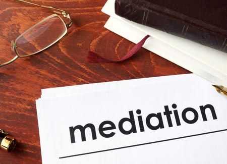 Mediation — Paper and Glasses on a Table in Mclean, VA