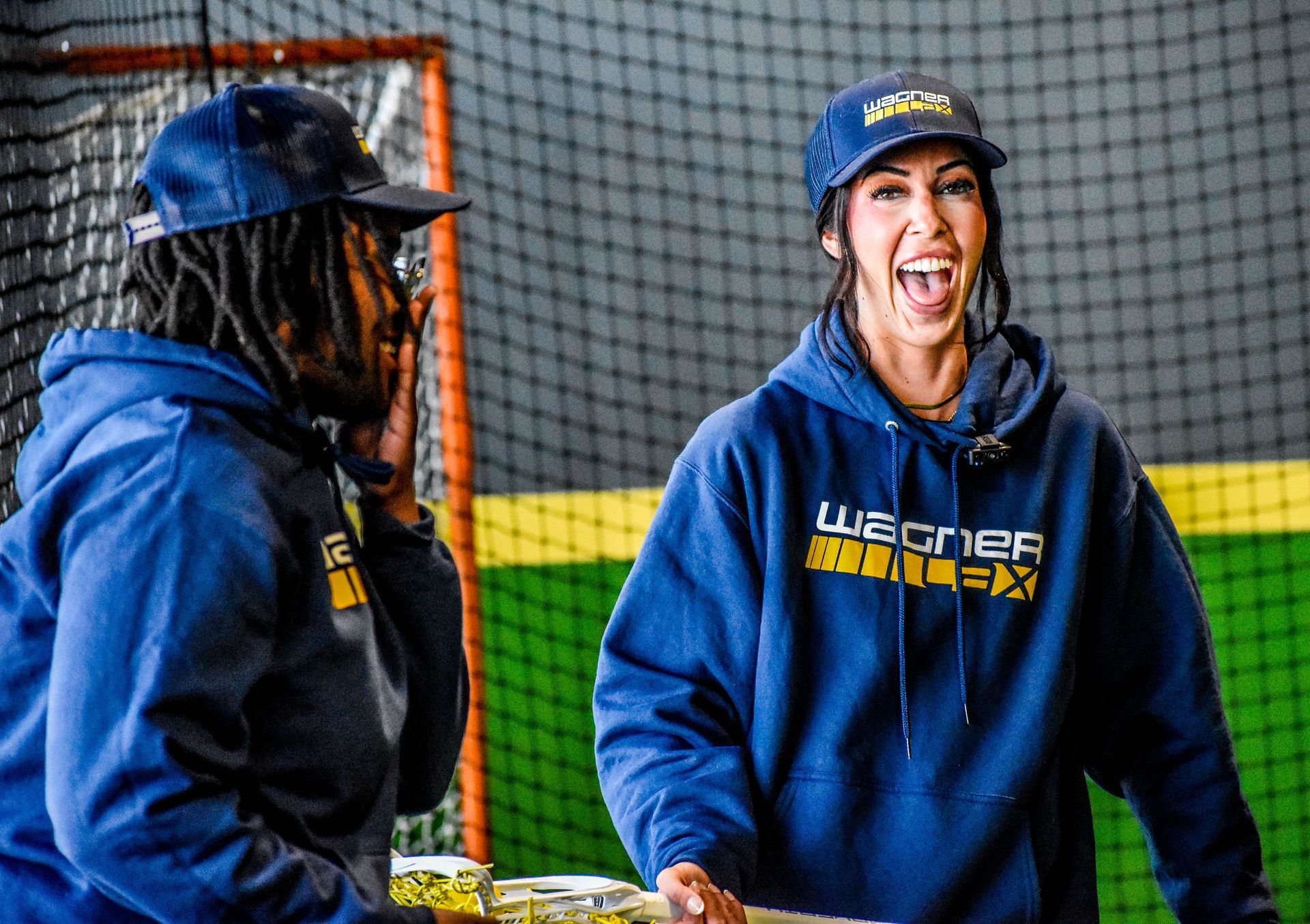 women's lacrosse coaches laughing