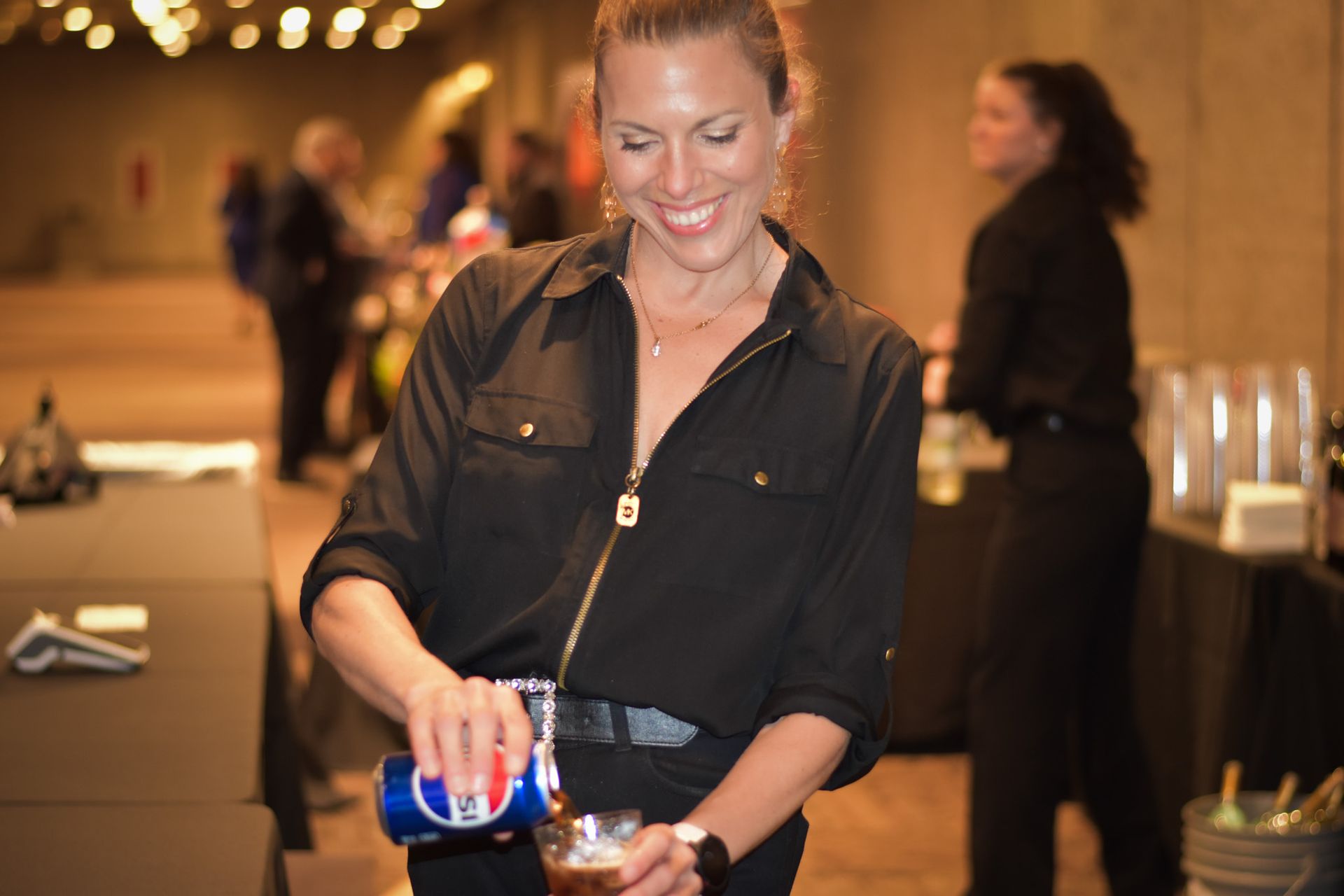 bartender pouring a drink