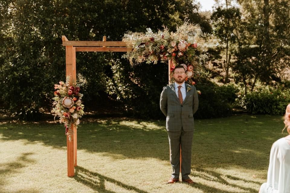 Lady Holding Two Bouquets of Flowers — Flowers by Suzanne in Morpeth, NSW